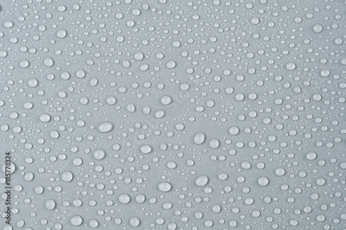 Texture of water drops on a gray background
