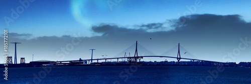 Night panoramic of the Costitución Bridge, in Cadiz, Spain © juanorihuela