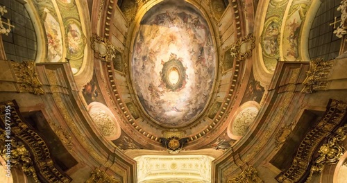 VIENNA, AUSTRIA – DECEMBER 2015 : Moving timelapse of St Peter's Church interior with paintings in view