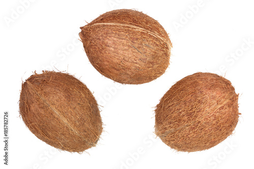 three whole coconut isolated on white background. Flat lay. Top view