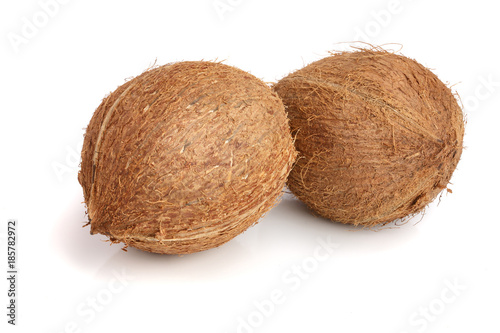 two whole coconut isolated on white background