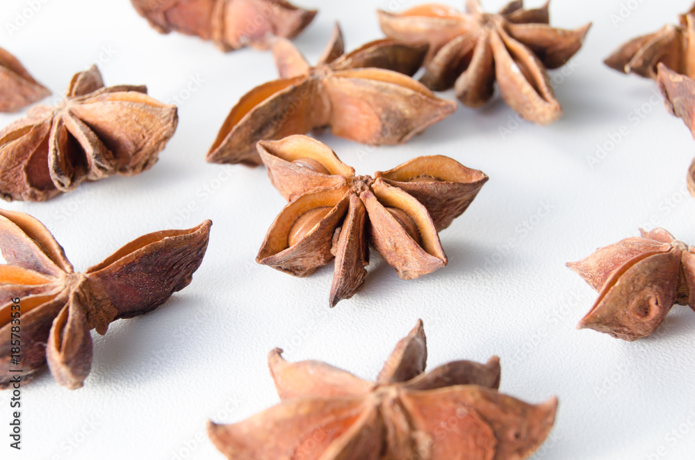 Spices star anise on a white background Spices star anise on a white background