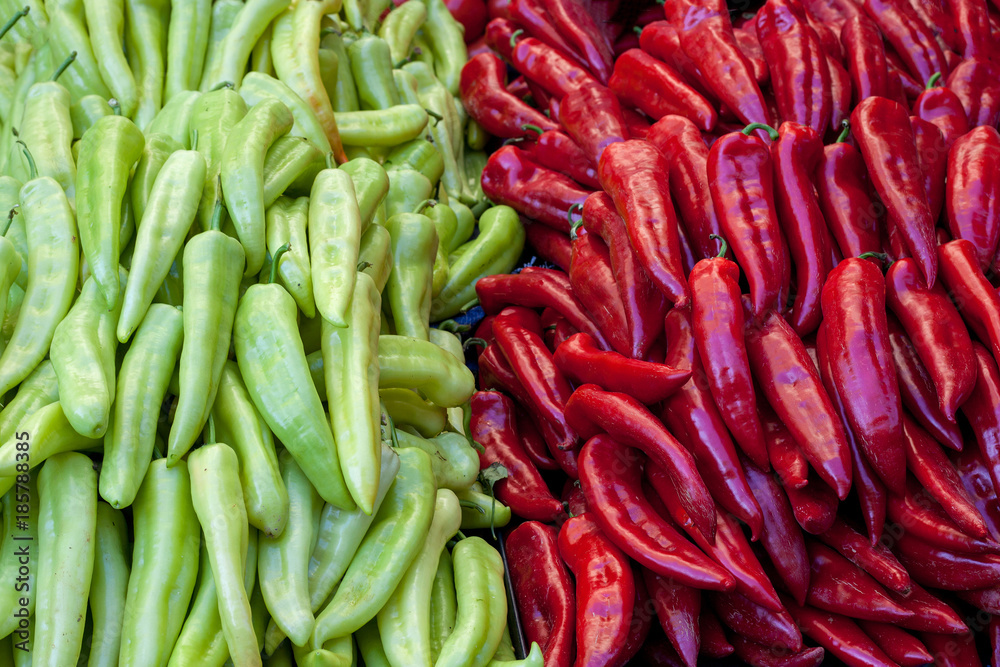 Red and green peppers, background, texture
