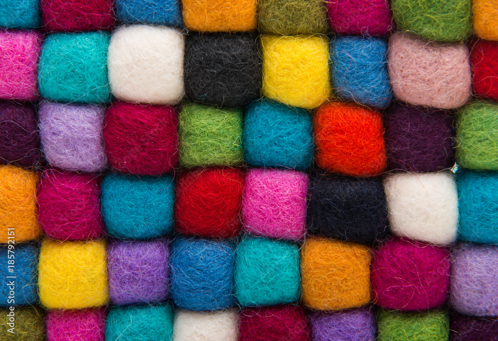 close-up of colored felted balls close-up of colored felted balls