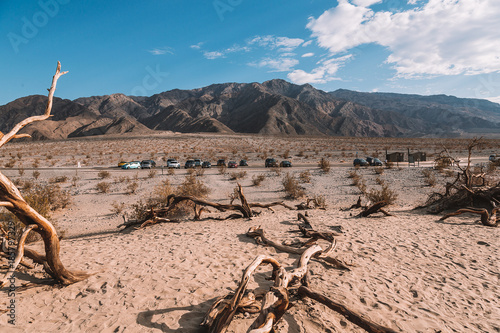 Death valley wildness with sand dunes warning signs and lifeless landscape photo