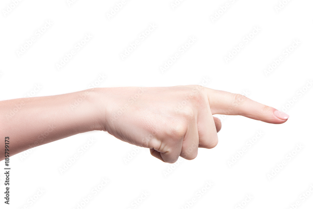 Woman hand pointing at something with index finger isolated on white background Woman hand pointing at something with index finger isolated on white background