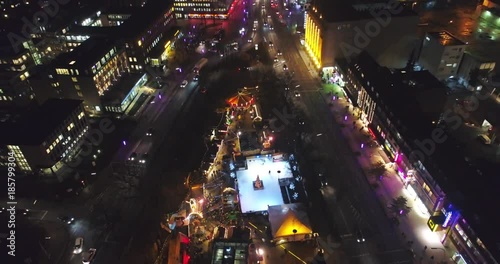 Aerial view of Hamburg, Germany. Wandsbek station. City traffic. Christmas decorations.Night. photo