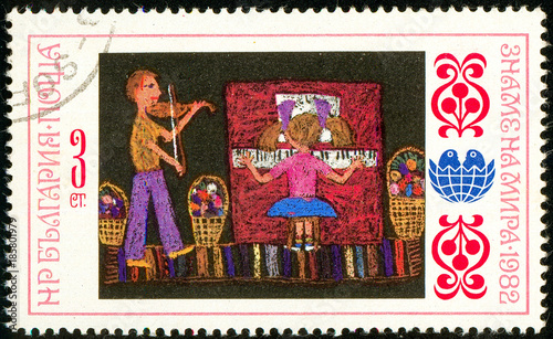 Ukraine - circa 2017: A postage stamp printed in Bulgaria shows children's drawing Concert. Series: International Children's Assembly Banner of Peace. Circa 1982.