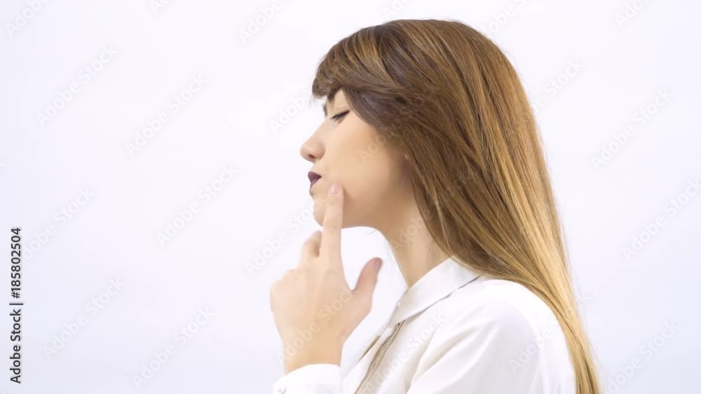 Beautiful thoughful girl with burgundy lips at white background Beautiful thoughful girl with burgundy lips at white background
