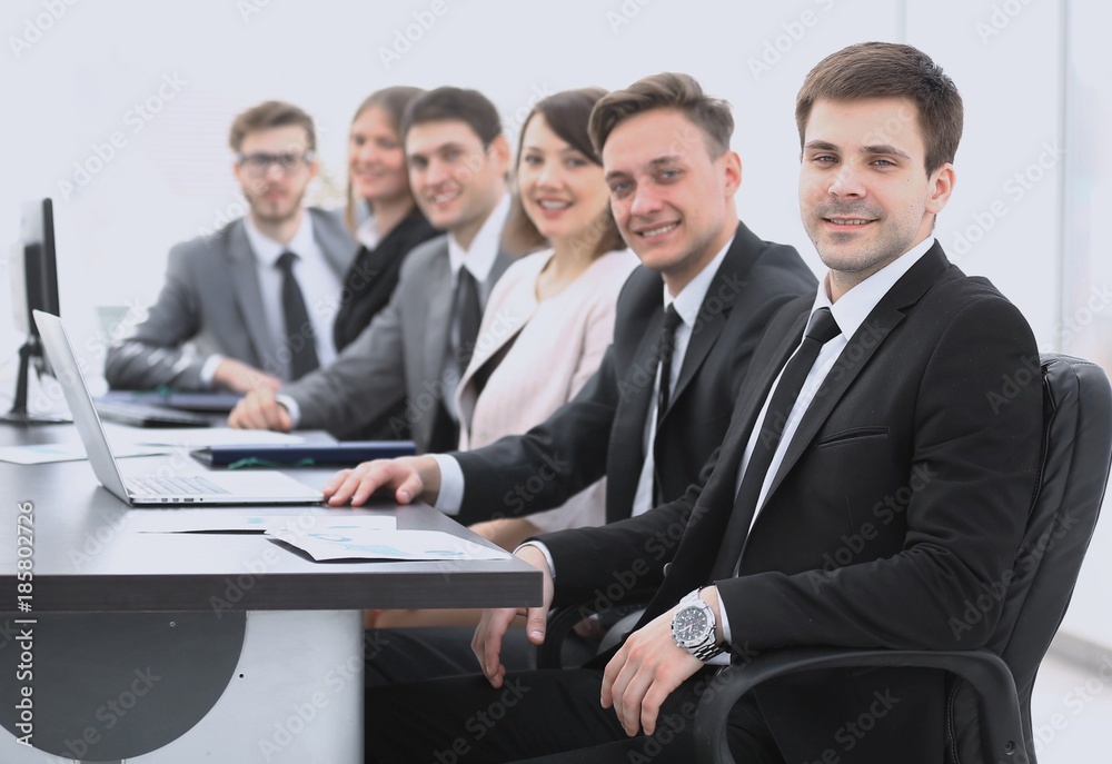project Manager and professional business team sitting at Desk project Manager and professional business team sitting at Desk