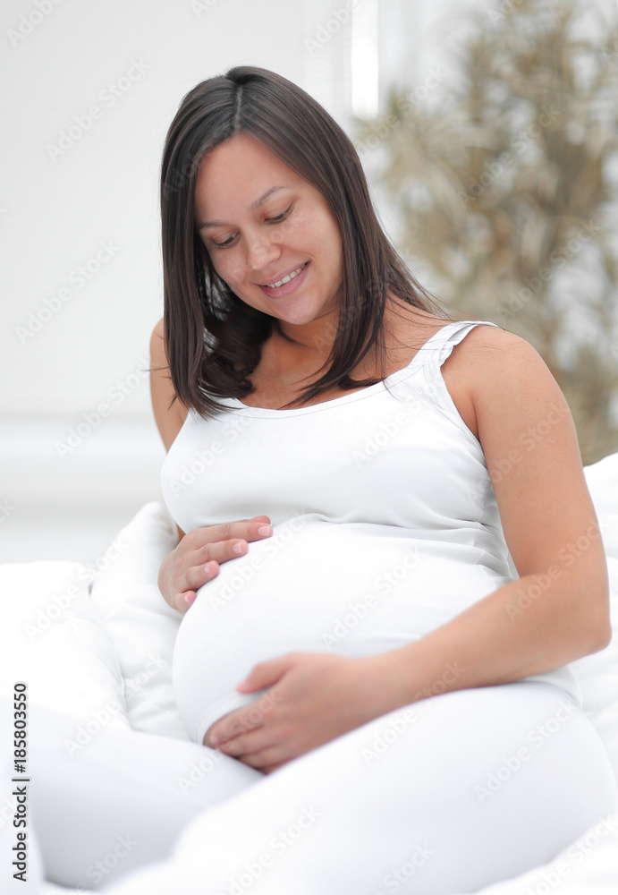portrait of a happy pregnant woman. portrait of a happy pregnant woman.