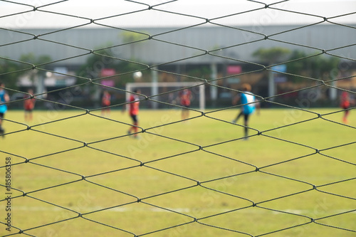 Behind goal of soccer field