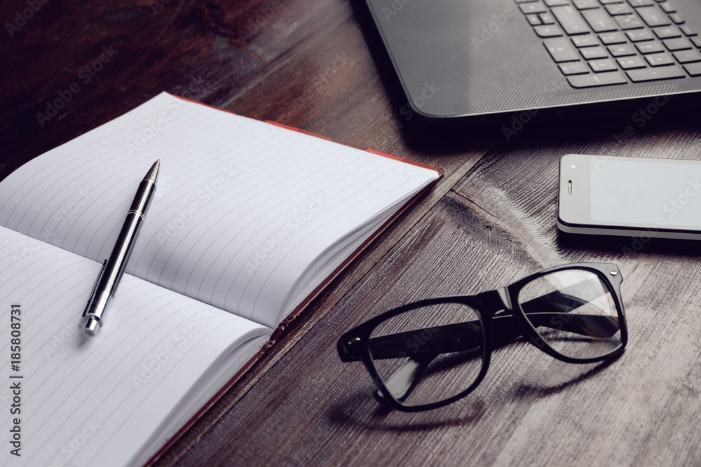 Fototapeta premium buisness set of laptop glasses smartphone and note book