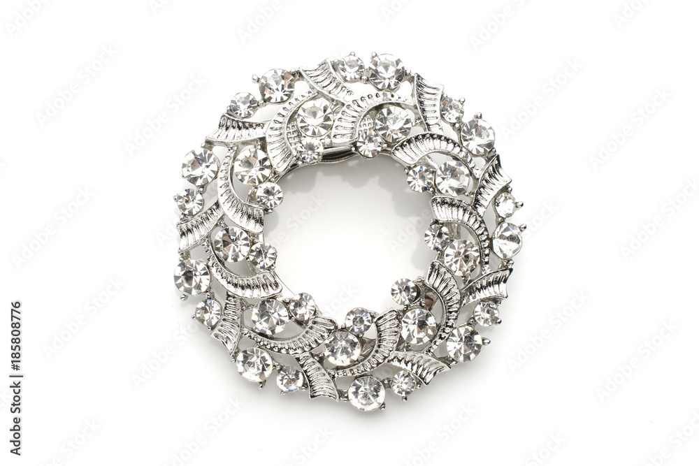 round brooch with diamonds isolated on white round brooch with diamonds isolated on white