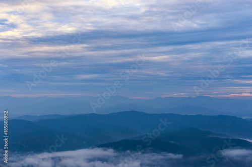 Fototapeta Naklejka Na Ścianę i Meble -  Beautiful cloudy weather in mountains, cloudy and fog