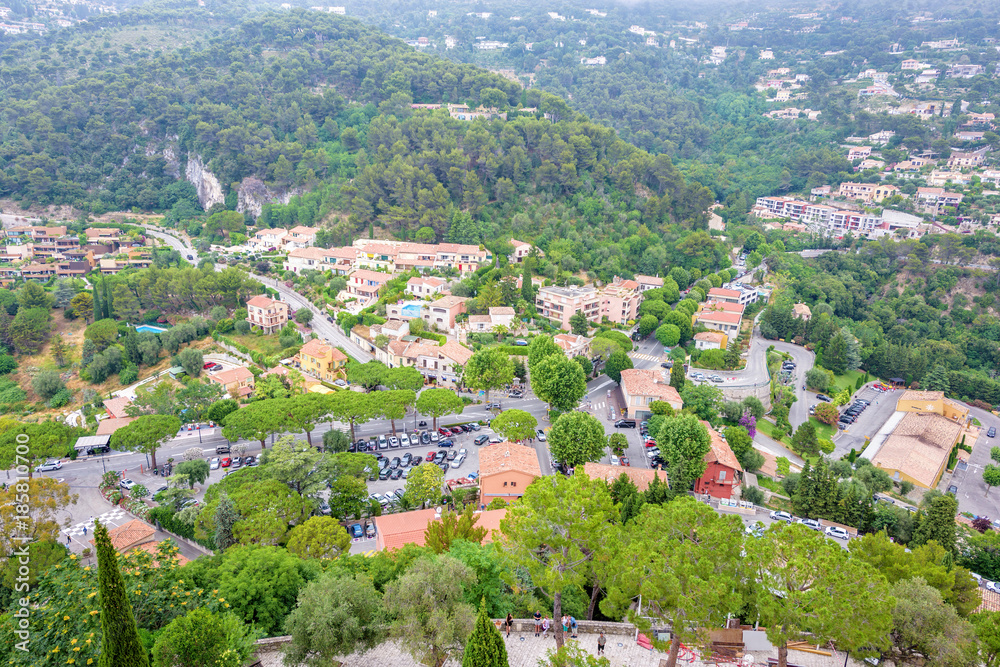 Daylight foggy view to Eze, Cote d'Azur village with medieval ho