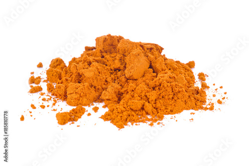 Heap of turmeric on isolated white background