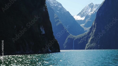 the view of sterling falls in milford sound from a cruise boat photo