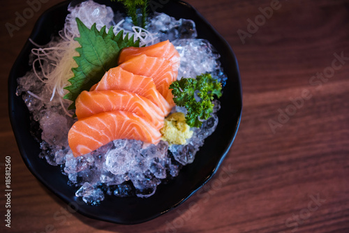 Salmon sashimi on wooden table