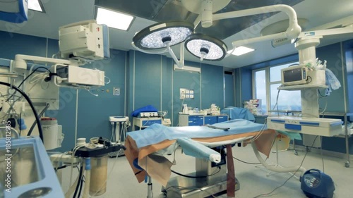 Empty modern surgery. New surgery room with medical electronic equipment. photo
