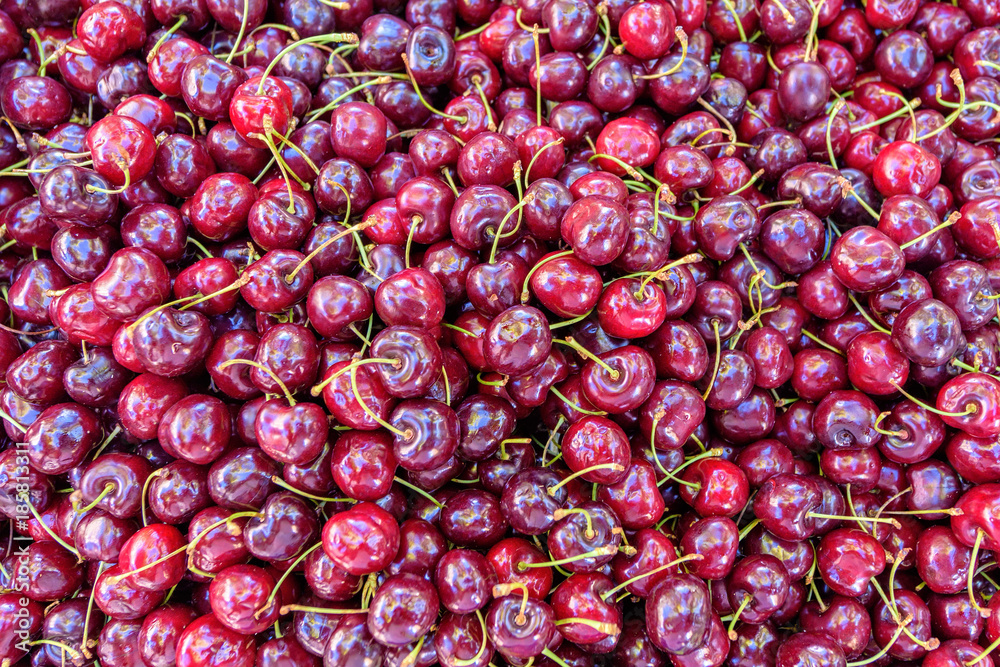 Fresh Red cherries for sale in local marketplace texture Fresh Red cherries for sale in local marketplace texture