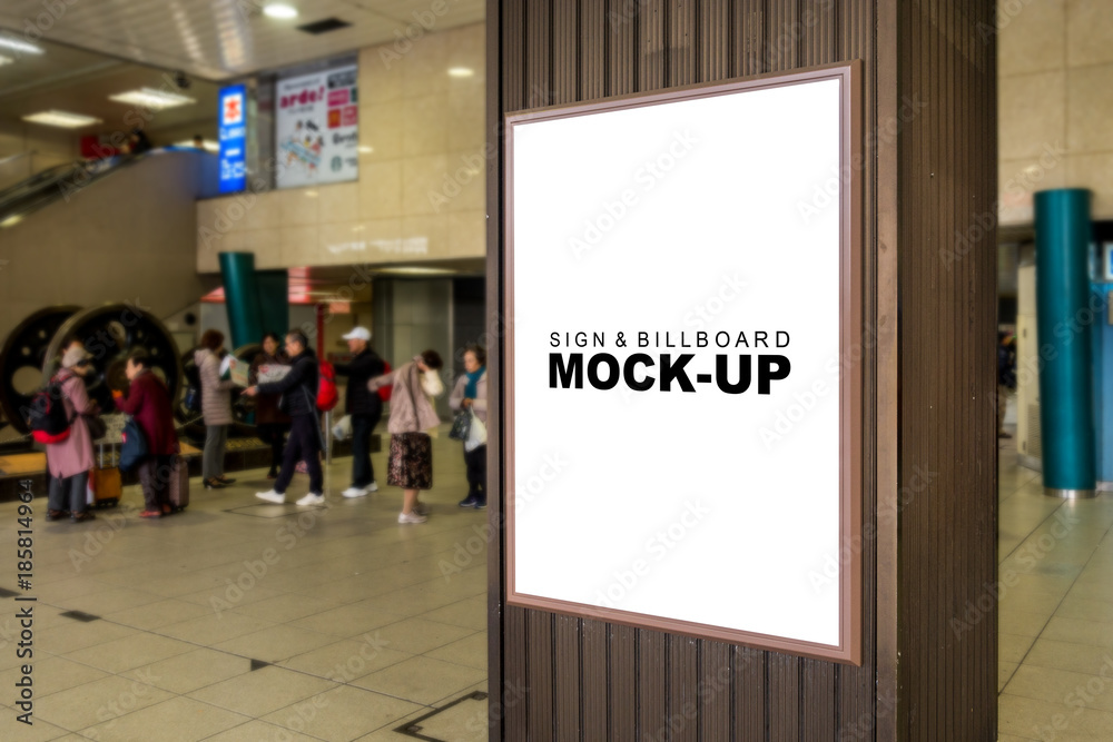 Empty white billboard mock up at underground train station Empty white billboard mock up at underground train station