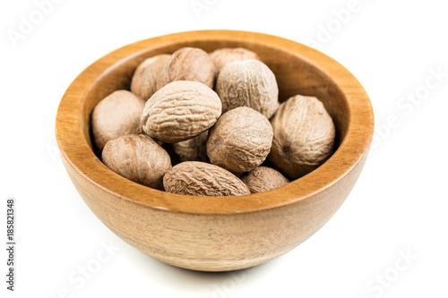 Pile of nutmeg seeds isolated on a white background