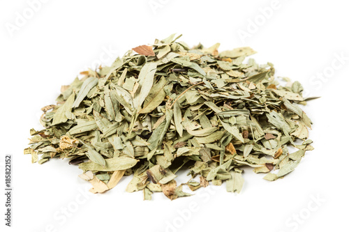 Pile of senna leaves isolated on a white background photo