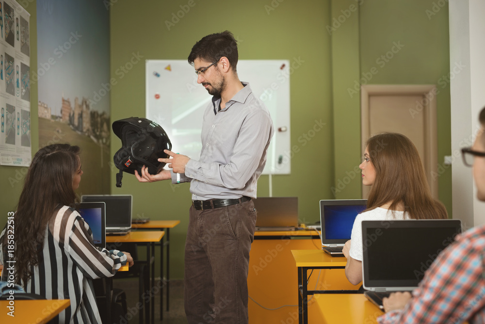 Fototapeta premium Teacher in driving school is preparing students for tests to obtain driver's licenses