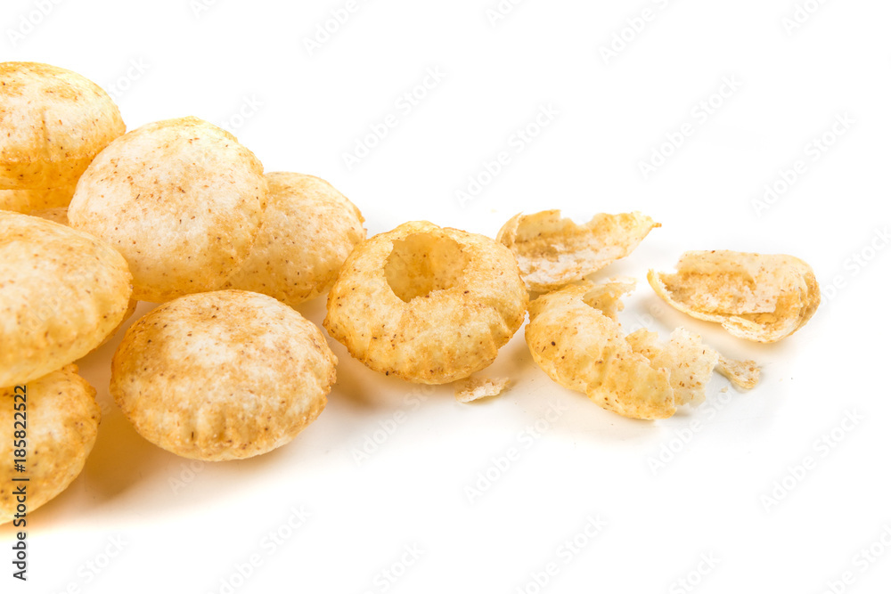 Puffed fried puri isolated on a white background isolated on a white background Puffed fried puri isolated on a white background isolated on a white background