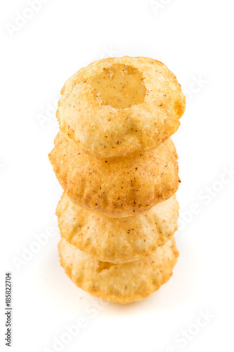 Puffed fried puri isolated on a white background isolated on a white background