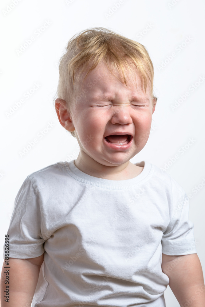 Little child cry. White background. Closeup. Little child cry. White background. Closeup.