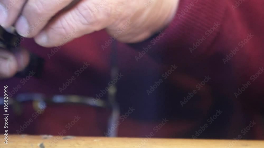 Watchmaker working on the correction of mechanical and quartz watches. Watchmaker working on the correction of mechanical and quartz watches.