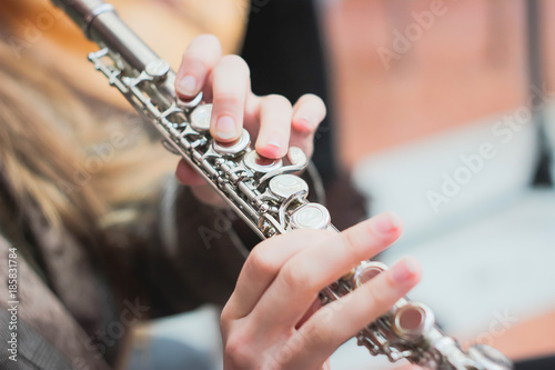 Canvas Print A girl plays a flute