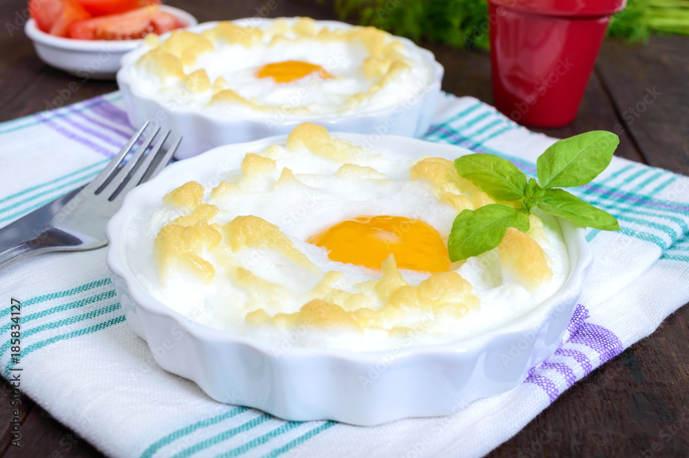 Delicate baked egg Orsini (eggs in the cloud). French breakfast. Delicate baked egg Orsini (eggs in the cloud). French breakfast.