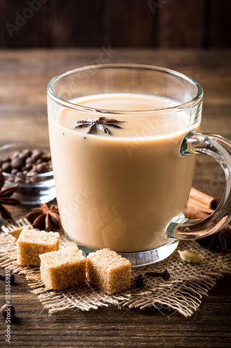 Indian masala chai on rustic wooden table