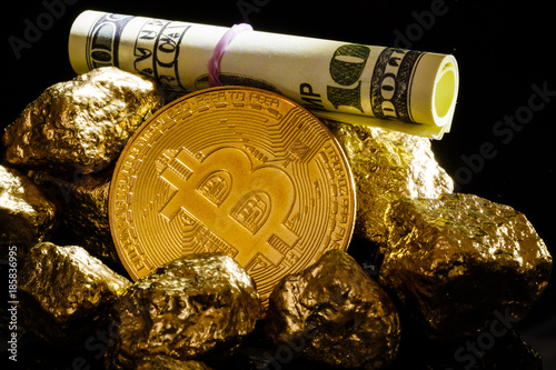 Photos Nugget gold and dollar bills business concept bitcoin