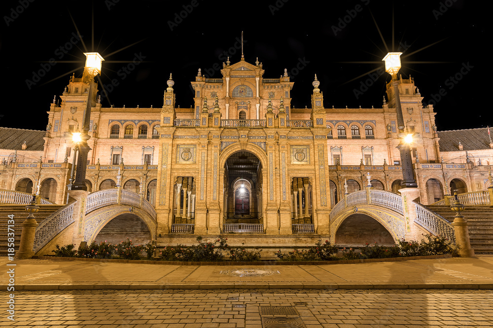 Spain Square (Plaza de Espana) at night, Seville, Spain, built on 1928, it is one example of the Regionalism Architecture mixing Renaissance and Moorish styles