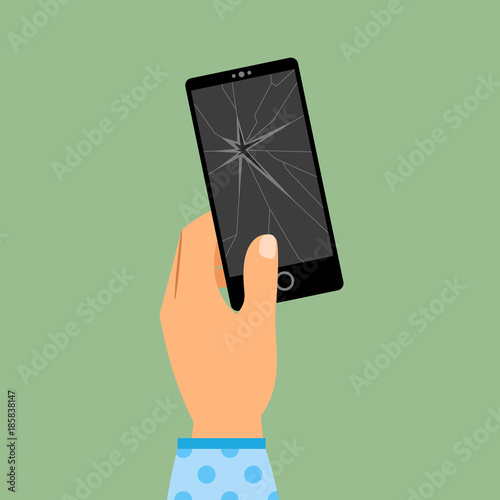 Womans hand holding broken smartphone