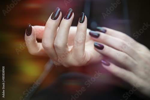 Stylish trendy female manicure. Nail design . Manicure nail paint . beautiful female hand with colorful nail art design manicure