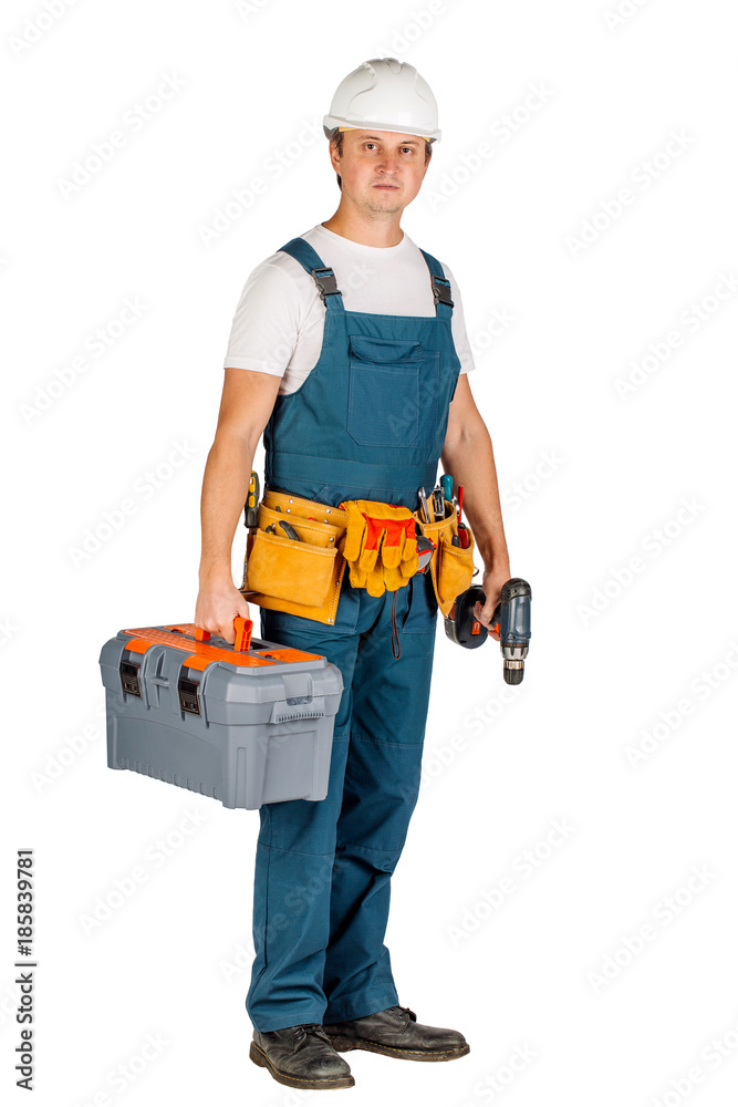 Full length portrait of a male builder in with helmet over white wall background. repair, construction, building, people and maintenance concept. Full length portrait of a male builder in with helmet over white wall background. repair, construction, building, people and maintenance concept.