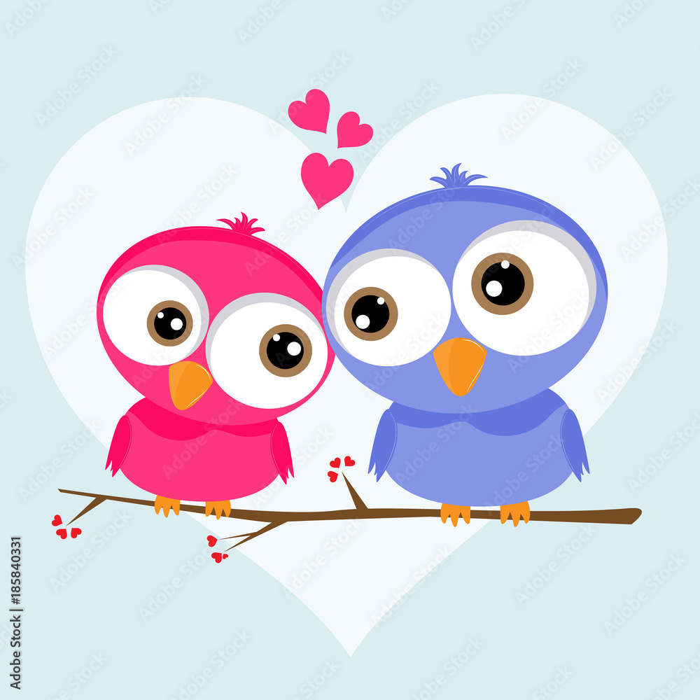 Fototapeta premium Two loving owls, happy birds are sitting on a tree.