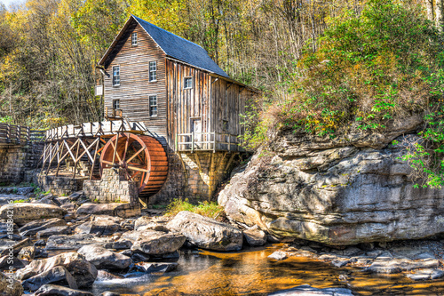 Babcock State Park Old Grist Mill in West Virginia autumn with river photo
