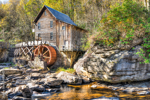 Babcock State Park Old Grist Mill in West Virginia autumn with river