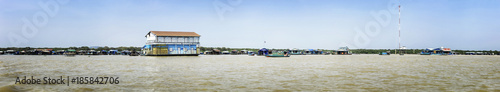 Panorama of Homes on stilts on the floating village of Kampong Phluk  Tonle Sap lake  Siem Reap province  Cambodia