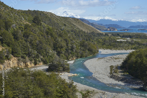 Rio los Maintenes flowing into the clear blue waters of Lago General Carrera in northern Patagonia, Chile 