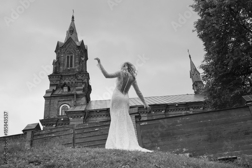 Beautiful bride in a white long dress