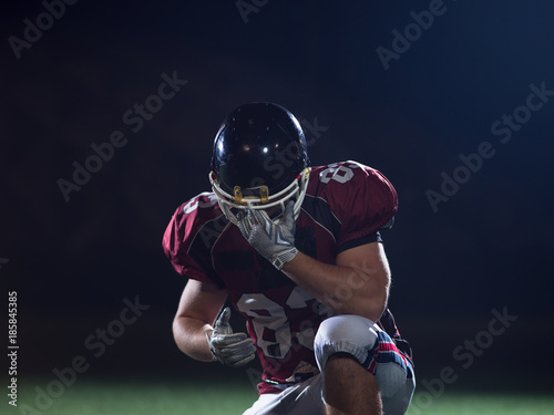 portrait of young confident American football player