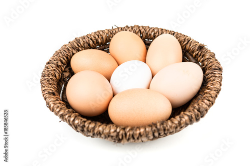 Wallpaper Mural Farm fresh and commercial eggs in a basket on a white background Torontodigital.ca