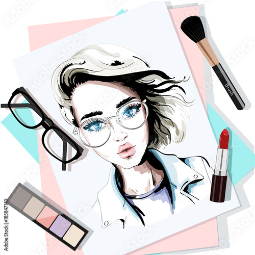 Stylish table set with hand drawn woman portrait, papers, lipstick, eyeglasses, brush and eyeshadows. Sketch. Vector illustration.